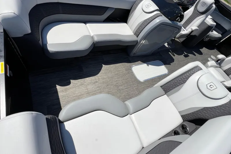 Slide: The Image of 2023 Godfrey Monaco 235 SB interior with luxurious seating and modern design. - 12