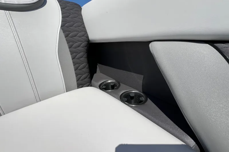 Slide: The Image of Interior seating and cup holders of 2023 Godfrey Monaco 235 SB boat. - 15