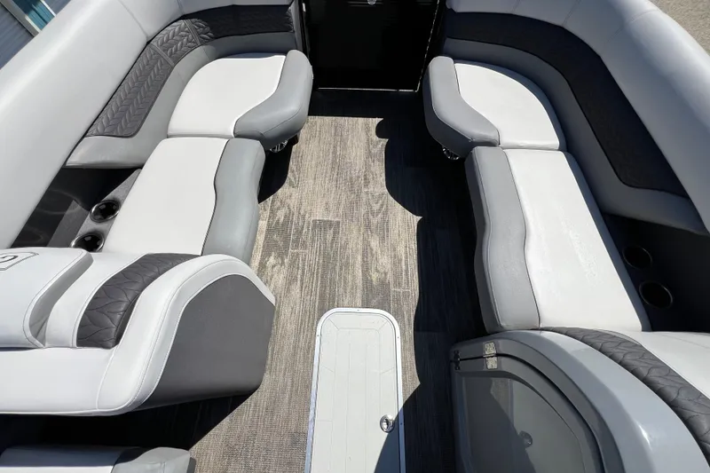 Slide: The Image of 2023 Godfrey Monaco 235 SB interior with stylish seating and modern flooring. - 16