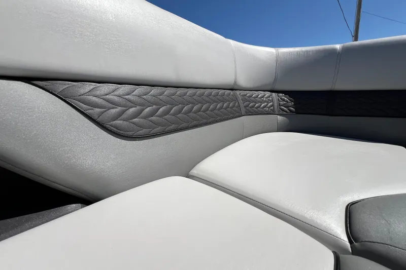 Slide: The Image of 2023 Godfrey Monaco 235 SB boat interior with elegant, textured seating design. - 17