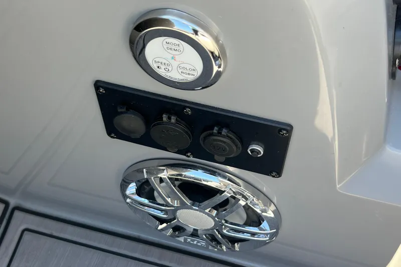 Slide: The Image of Control panel and speaker on 2023 Godfrey Monaco 235 SB boat. - 26