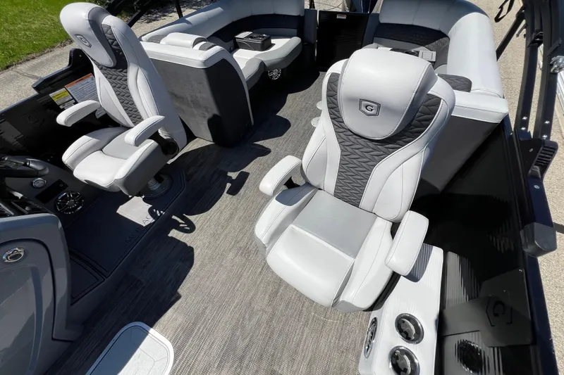 Slide: The Image of Luxurious interior of 2023 Godfrey Monaco 235 SB pontoon boat with plush seating. - 30