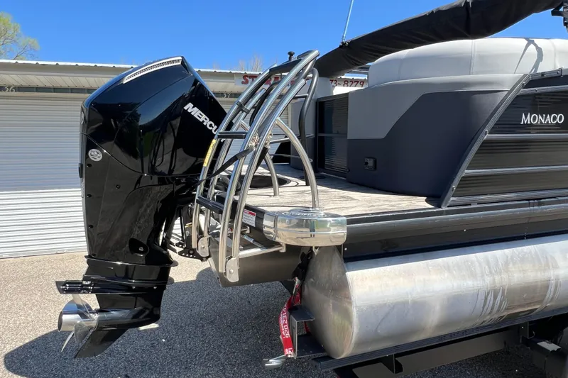 Slide: The Image of 2023 Godfrey Monaco 235 SB pontoon boat with Mercury outboard motor. - 5