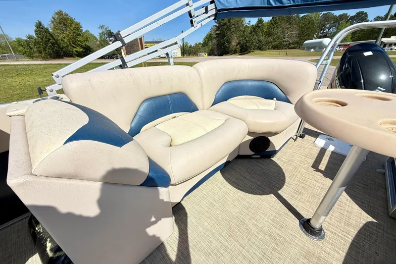Slide: The Image of 2015 Landau Signature 2500 Cruise boat interior with cushioned seating and table. - 18