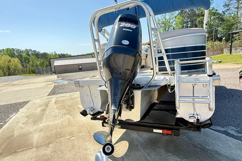 Slide: The Image of 2015 Landau Signature 2500 Cruise pontoon boat with 200 HP outboard motor. - 3