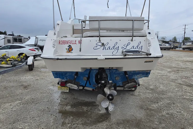 Slide: The Image of 1996 Wellcraft 26 Exel SE boat named "Shady Lady" in Robbinsville, NJ parking lot. - 10