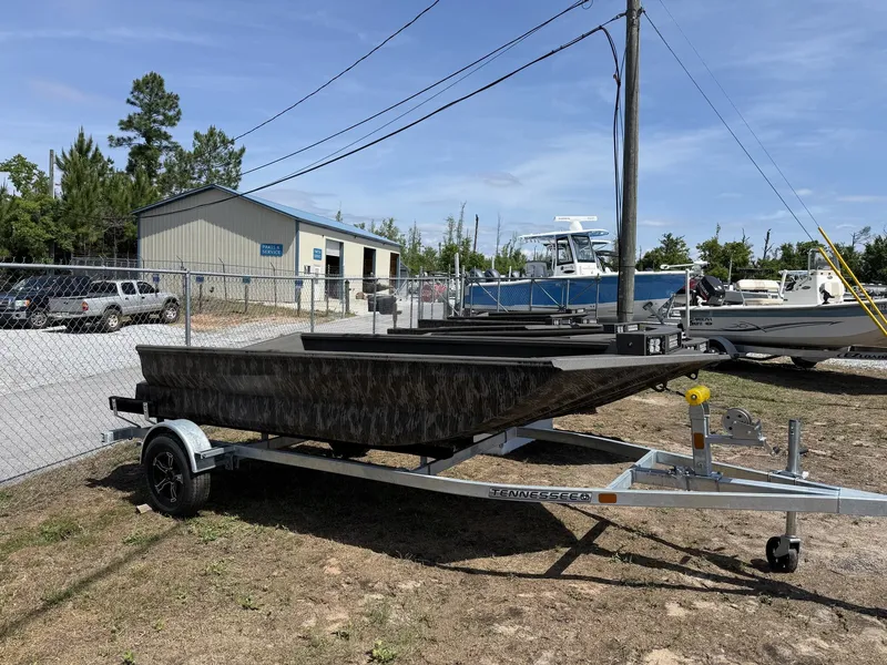 The Image of Reaper Boats 553 from 2026 parked on trailer outdoors. - 1