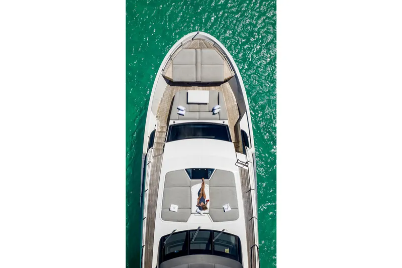 Slide: The Image of Aerial view of 2021 Sanlorenzo SL96A yacht on turquoise water. - 14
