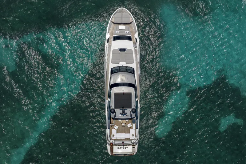 Slide: The Image of Aerial view of 2021 Sanlorenzo SL96A yacht on turquoise water. - 15