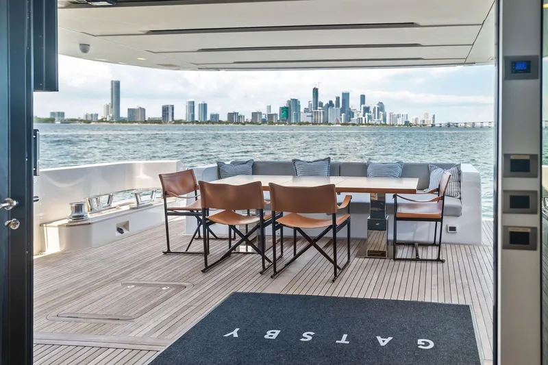 Slide: The Image of Luxurious Sanlorenzo SL96A yacht deck with city skyline view, 2021 model. - 17