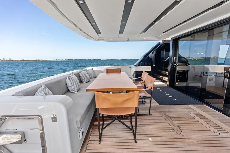 Slide: The Image of Luxurious 2021 Sanlorenzo SL96A yacht deck with elegant seating and ocean view. - 19