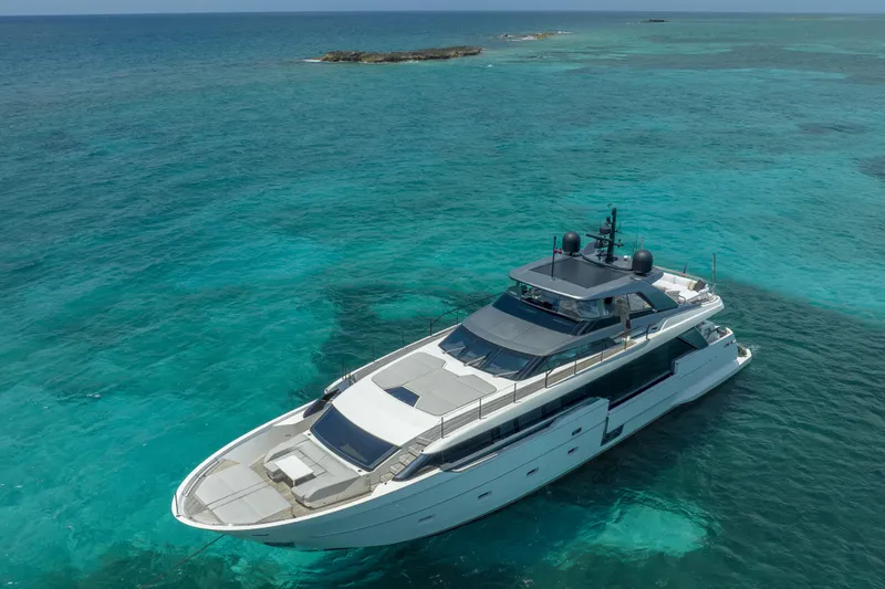 Slide: The Image of Luxurious 2021 Sanlorenzo SL96A yacht cruising in clear turquoise waters. - 2