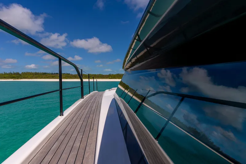 Slide: The Image of Sanlorenzo SL96A yacht deck with ocean view, 2021 model, reflecting clear blue skies. - 22