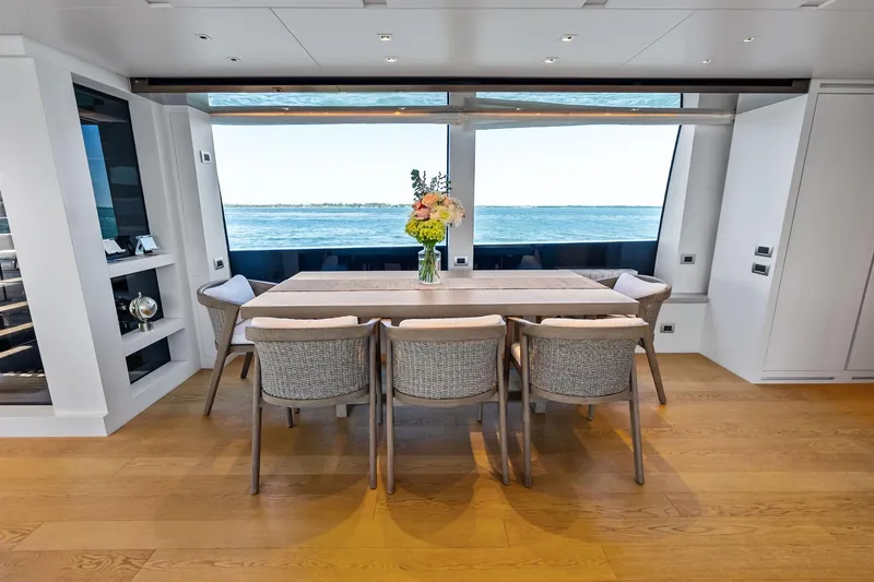Slide: The Image of Luxurious dining area on 2021 Sanlorenzo SL96A yacht with ocean view. - 24