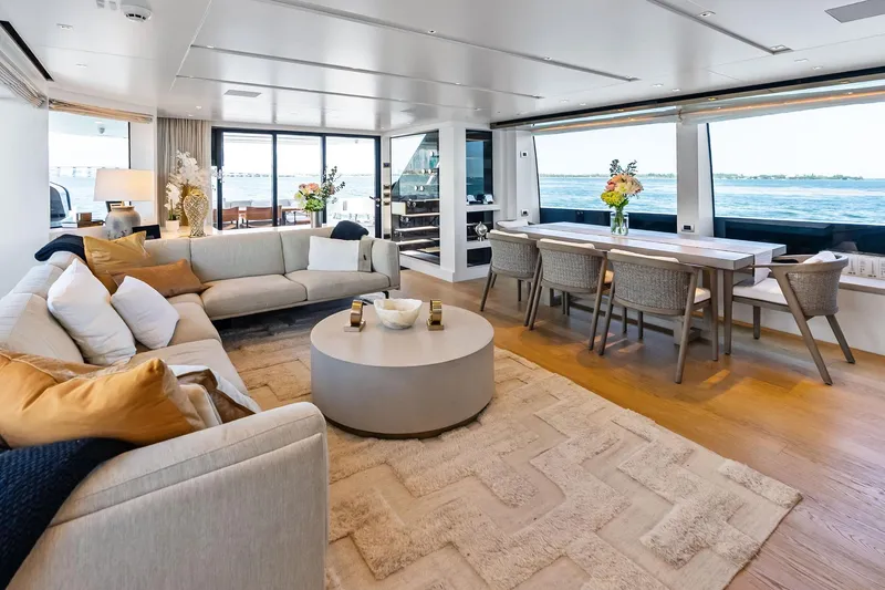 Slide: The Image of Luxurious interior of 2021 Sanlorenzo SL96A yacht with elegant seating and dining area. - 26