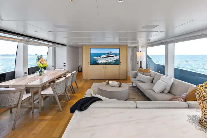 Slide: The Image of Luxurious interior of 2021 Sanlorenzo SL96A yacht with elegant seating and ocean view. - 27