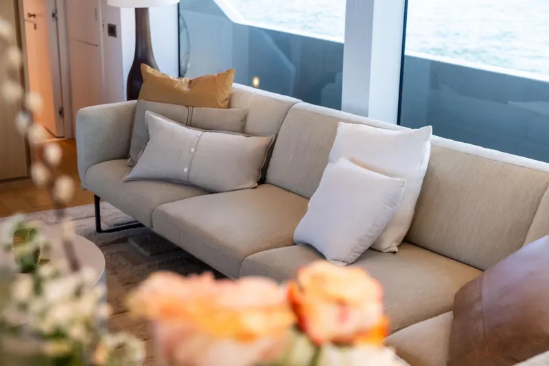 Slide: The Image of Luxurious interior of 2021 Sanlorenzo SL96A yacht with elegant beige sofa and cushions. - 29