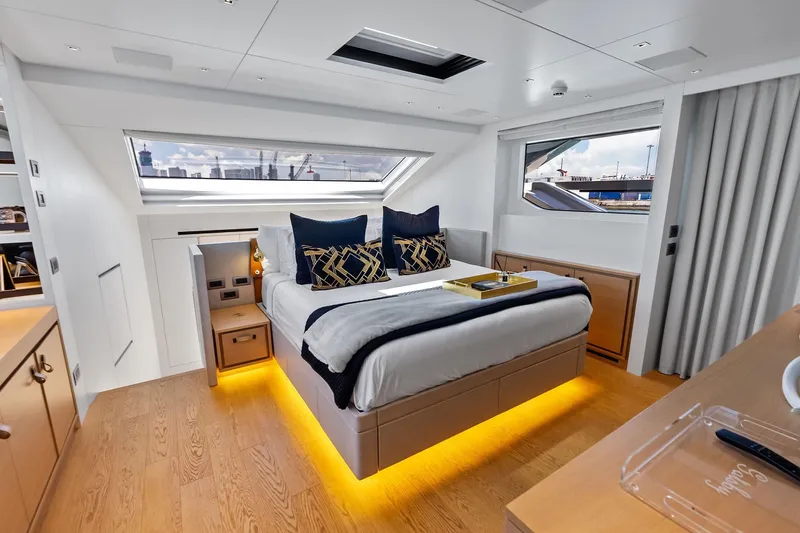 Slide: The Image of Luxurious bedroom interior of 2021 Sanlorenzo SL96A yacht with modern design and ambient lighting. - 32