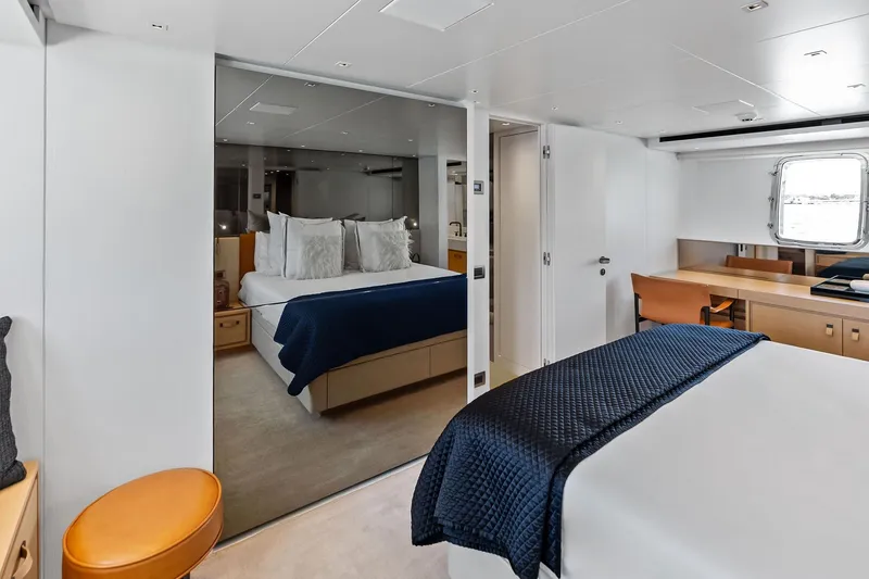 Slide: The Image of Luxurious bedroom interior of 2021 Sanlorenzo SL96A yacht with modern furnishings. - 38