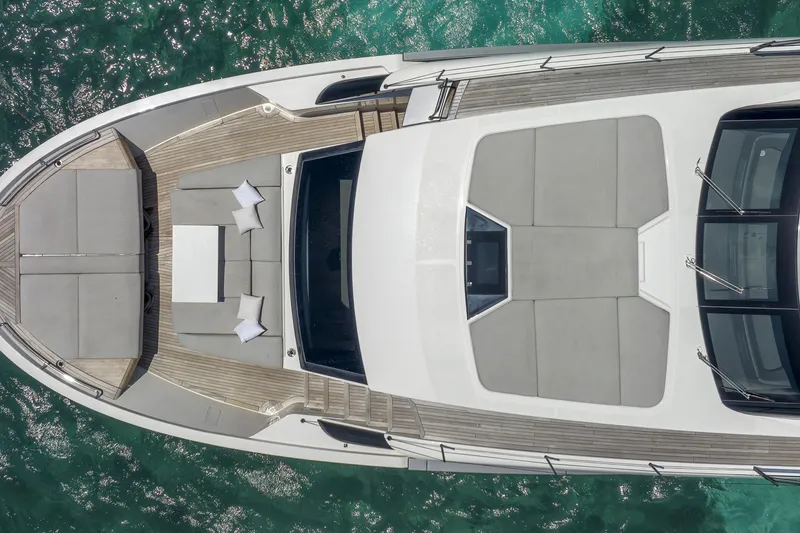Slide: The Image of Aerial view of 2021 Sanlorenzo SL96A yacht with spacious deck and seating area. - 4