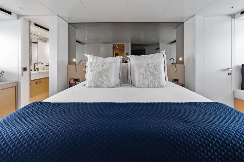 Slide: The Image of Luxurious bedroom on 2021 Sanlorenzo SL96A yacht with elegant decor and plush bedding. - 40