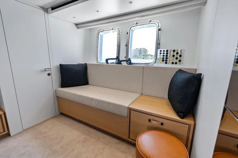 Slide: The Image of Modern interior of 2021 Sanlorenzo SL96A yacht with cozy seating and windows. - 42