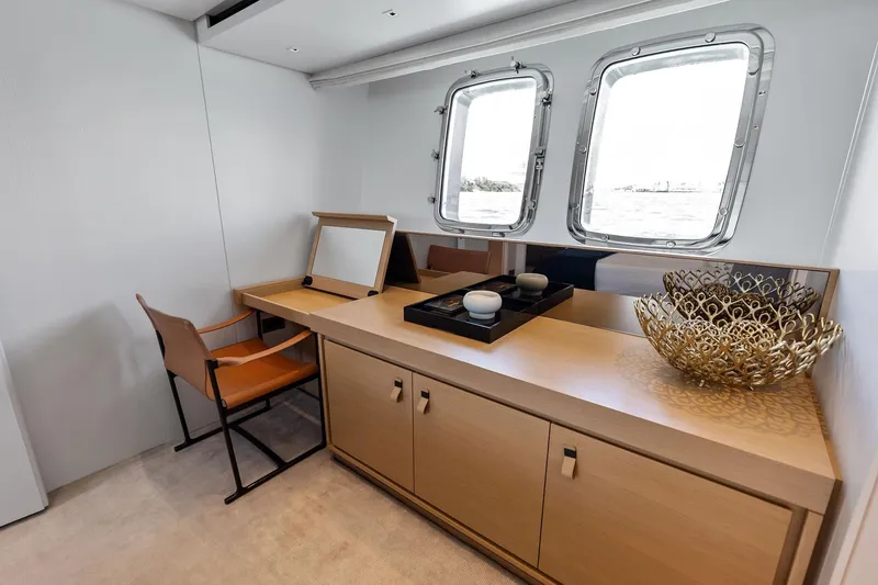Slide: The Image of Luxurious interior of 2021 Sanlorenzo SL96A yacht with elegant desk and decor. - 43
