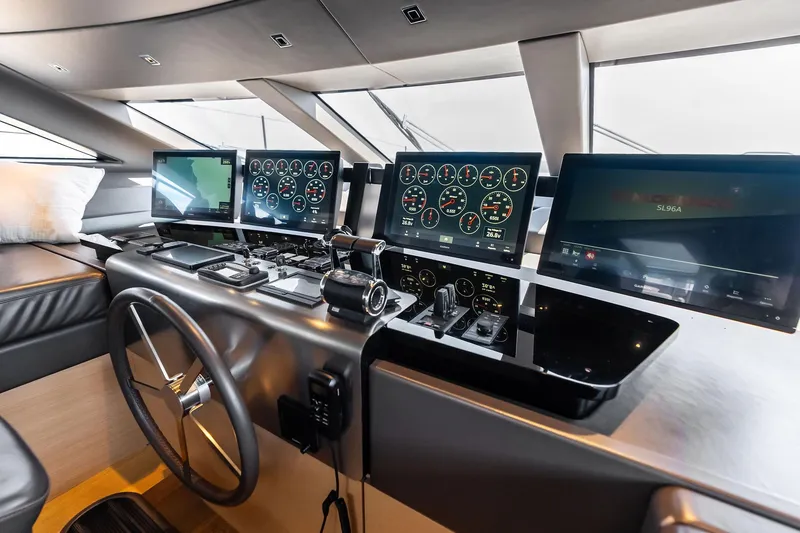 Slide: The Image of Helm of 2021 Sanlorenzo SL96A yacht with advanced navigation displays. - 58