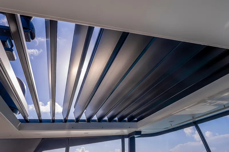 Slide: The Image of Rooftop view of Sanlorenzo SL96A yacht, showcasing sleek design and open sky, 2021 model. - 6