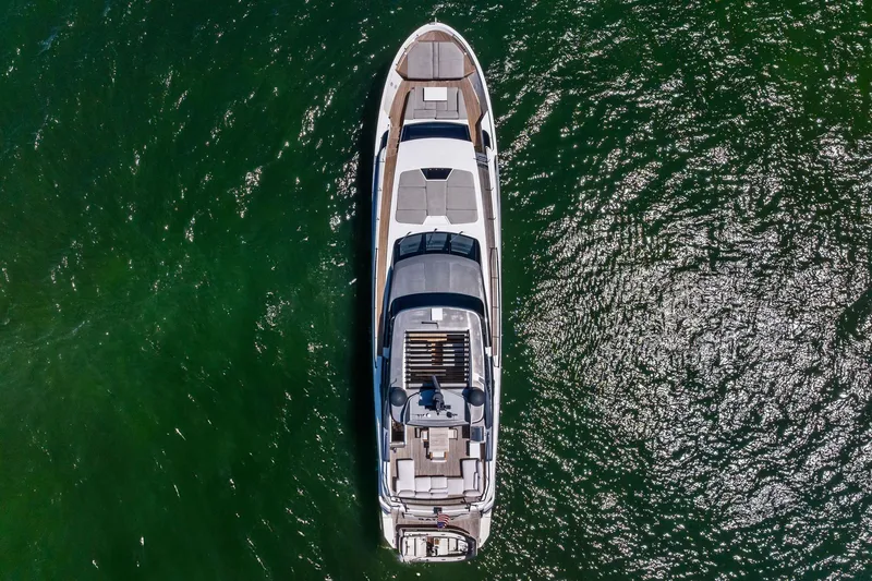 Slide: The Image of Aerial view of 2021 Sanlorenzo SL96A yacht on green water. - 61