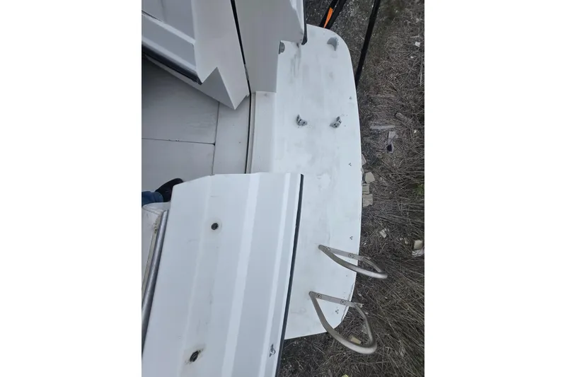 Slide: The Image of 1987 Carver 32 Mariner boat deck with ladder, viewed from above. - 23