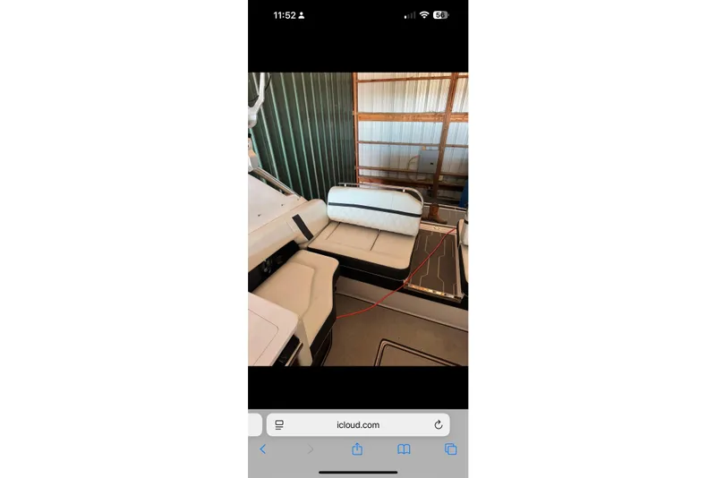 Slide: The Image of Interior view of a 2020 Regal 2800 Bowrider boat with beige seating. - 6