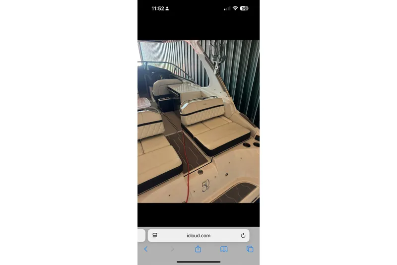 Slide: The Image of 2020 Regal 2800 Bowrider interior with beige seating and sleek design. - 8