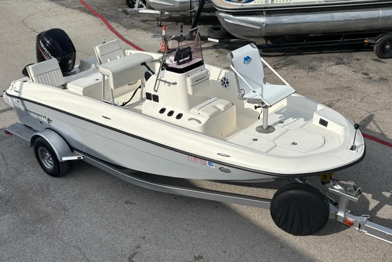 The Image of 2019 Bayliner Element F18 boat on trailer, featuring sleek design and spacious seating. - 0