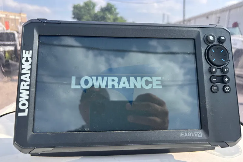 Slide: The Image of Lowrance Eagle 9 fishfinder on 2019 Bayliner Element F18 boat dashboard. - 24
