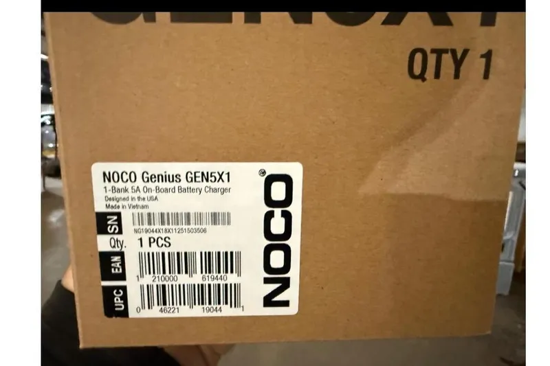 Slide: The Image of NOCO Genius GEN5X1 battery charger packaging label. - 53