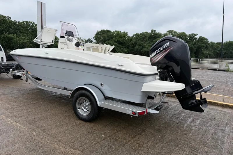 Slide: The Image of 2019 Bayliner Element F18 boat on trailer with Mercury outboard motor. - 60