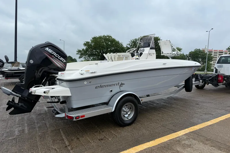 Slide: The Image of 2019 Bayliner Element F18 boat on trailer with Mercury outboard motor. - 67