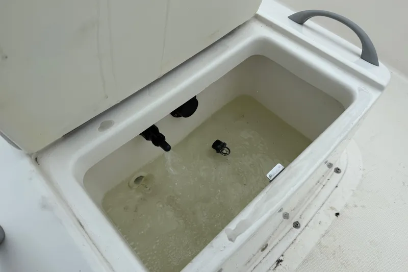 Slide: The Image of Livewell in 2019 Bayliner Element F18 boat, partially filled with water. - 78