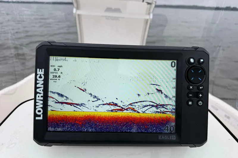 Slide: The Image of Lowrance fish finder display on 2019 Bayliner Element F18 boat, showing underwater details. - 79