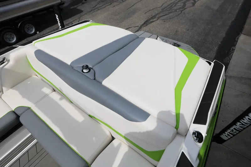Slide: The Image of 2019 Axis T22 boat with white and green cushioned seating. - 17