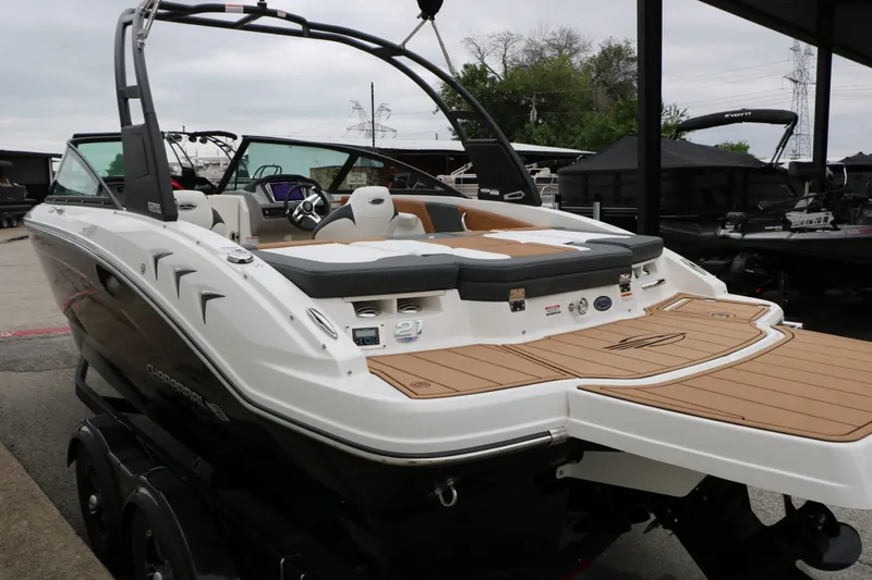 Slide: The Image of 2026 Chaparral 21 SSi boat with sleek design and luxurious interior. - 20