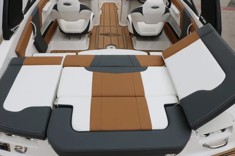 Slide: The Image of Interior of 2026 Chaparral 21 SSi featuring luxurious seating. - 25