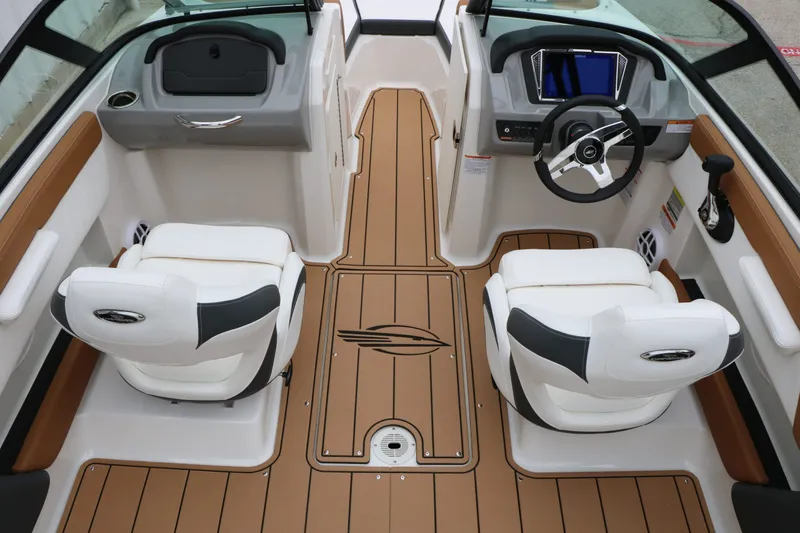 Slide: The Image of Interior of 2026 Chaparral 21 SSi with modern seating and dashboard. - 27