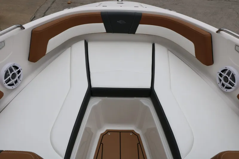 Slide: The Image of Interior of 2026 Chaparral 21 SSi with brown and white upholstery. - 28