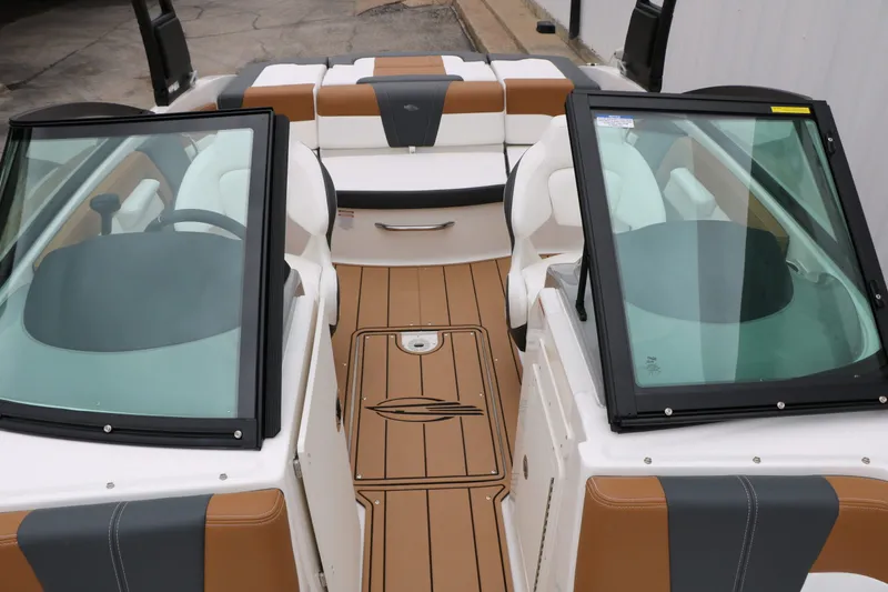 Slide: The Image of Interior of 2026 Chaparral 21 SSi with modern seating and dashboard. - 30