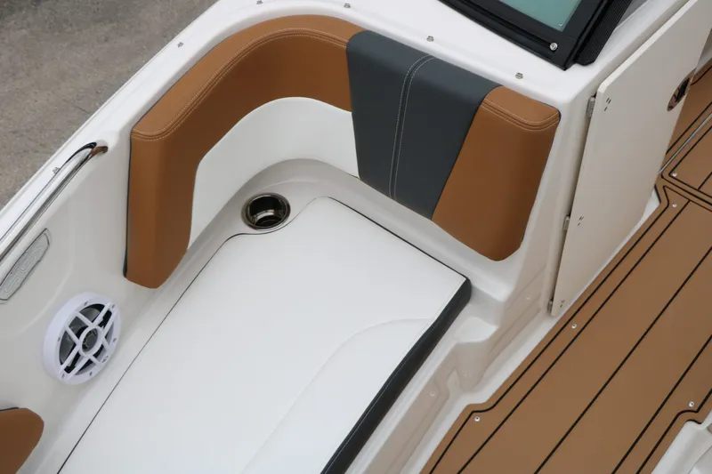 Slide: The Image of 2026 Chaparral 21 SSi interior with brown and gray upholstery. - 32
