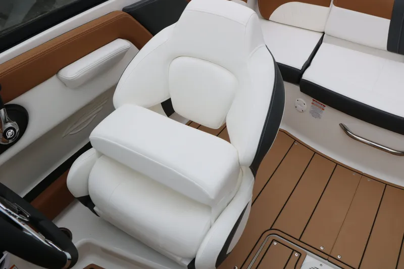 Slide: The Image of Interior of 2026 Chaparral 21 SSi featuring white seating. - 36