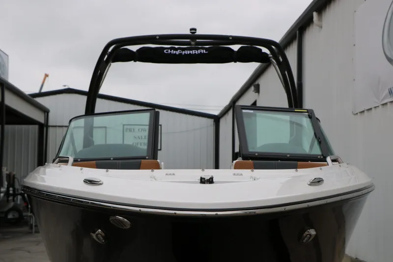Slide: The Image of 2026 Chaparral 21 SSi boat, front view at dock. - 4