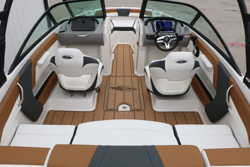 Slide: The Image of Interior of 2026 Chaparral 21 SSi with modern seating and dashboard. - 49